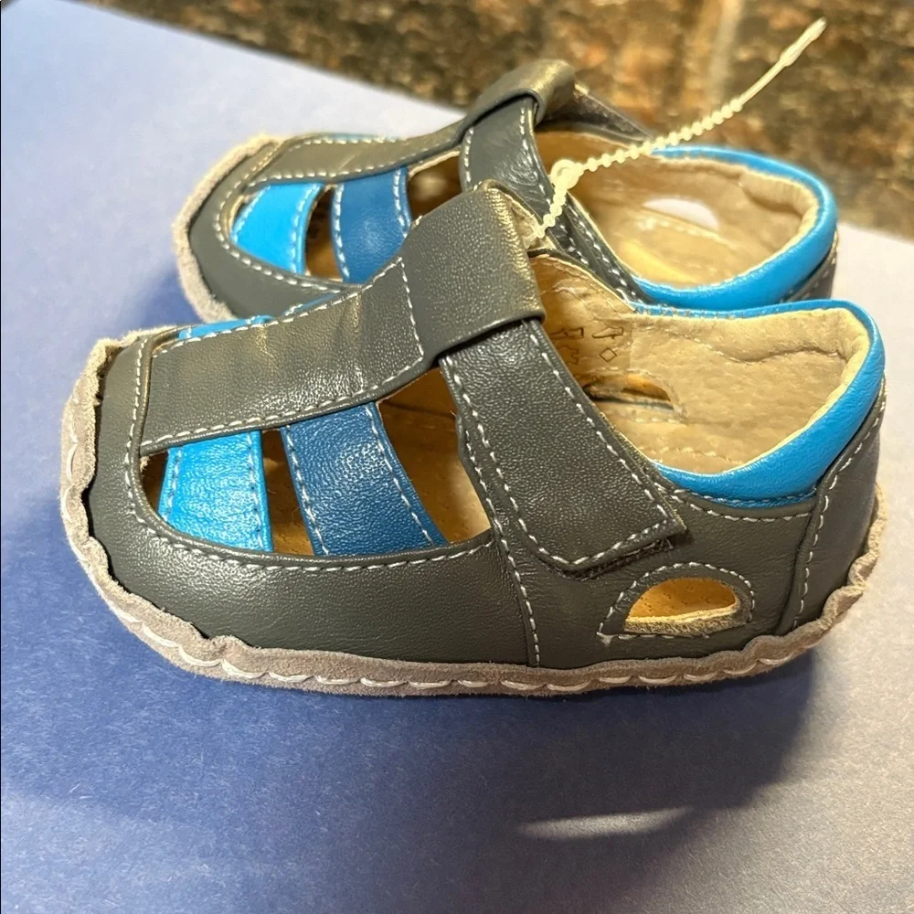 Smaller by See Kai Run infant shoes, excellent condition.